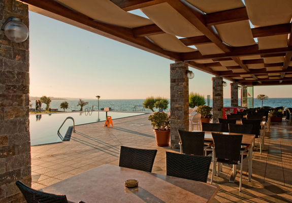 Ariadne Hotel Malia bar sitting area with pool view