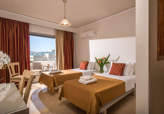 Ariadne Hotel Malia Family Room twin beds, balcony view and amenities