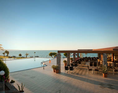 Ariadne Hotel Malia bar sitting area next to the pool